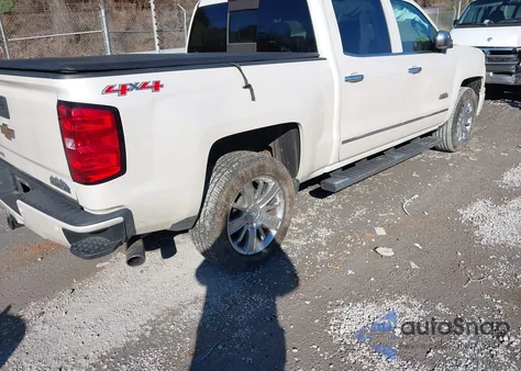 2015 Chevrolet Silverado K1500 High Country z USA, uszkodzony, nr VIN 3GCUKTEJXFG445591